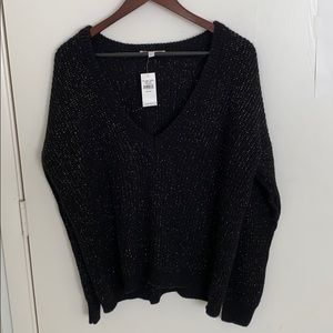 Black and gold v neck sweater